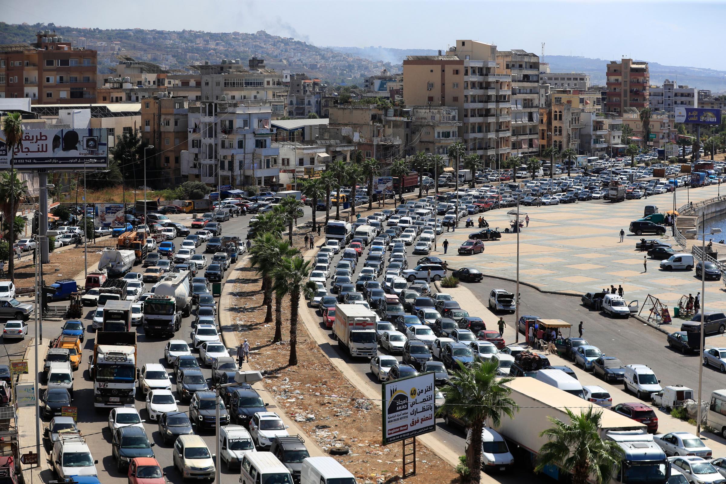 Thousands clog highways as Lebanese try to flee out of Israeli firing line