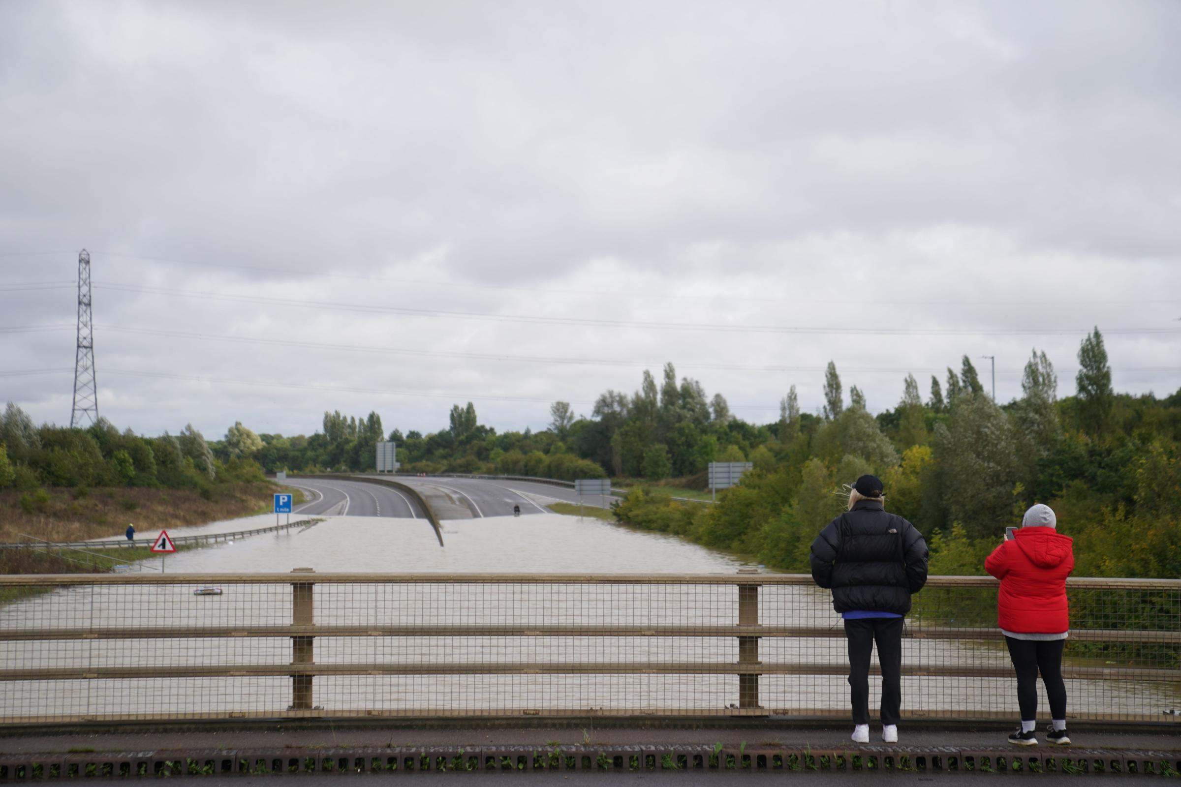 Commuters face road closures and disrupted rail services following flooding